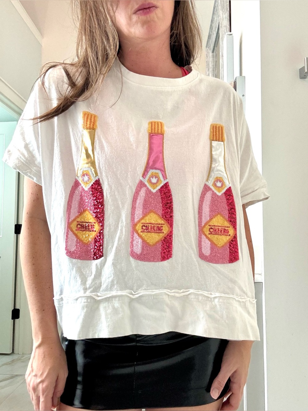 Peach Love Party Tee with Pink Champagne Bottle Appliquรฉs